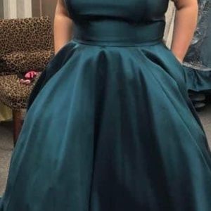 emerald green size 18 brand new never worn, then I have a coral pink size 20.